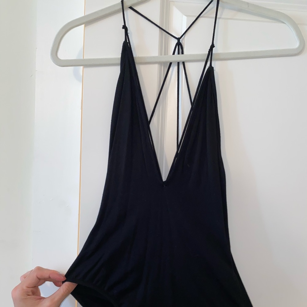 A black v neck body suit from urban outfitters
